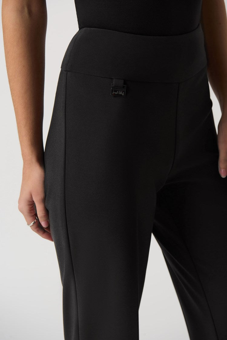 Add the Joseph Ribkoff Wide-Leg Pull-On Pants to your wardrobe, and you'll have a go-to style for any occasion. This bonded silky knit material is highly sought after and perfect for creating various looks. The wide-leg silhouette is flattering on any figure, while the contoured waistband provides a comfortable, tailored fit. 