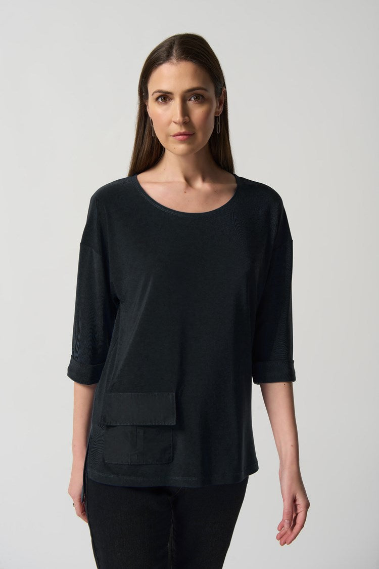 This lovely Joseph Ribkoff Dolman Sleeve Boxy Top is made in a smooth woven fabric creates this silky knit top. Intentional design features include boxy silhouette, three-quarter dolman sleeves and folded cuffs. A practical side pocket rounds out the look that is perfect to wear dressed up or casual with jeans.