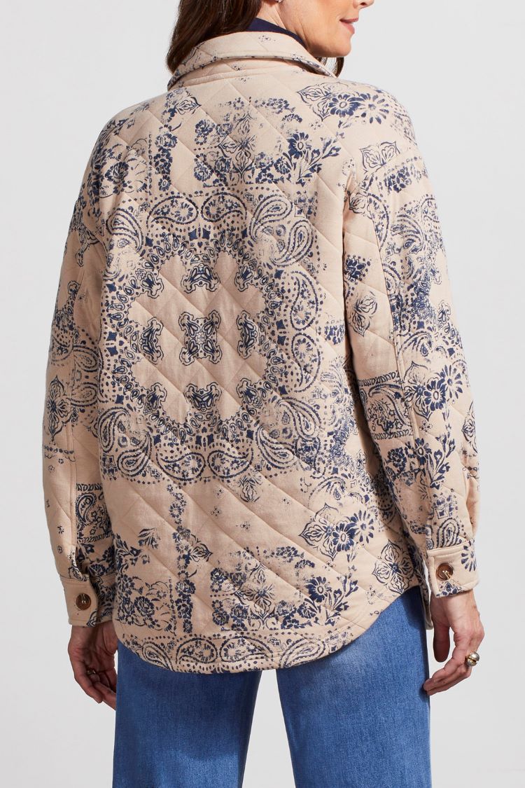 The Tribal Quilted Printed Shacket is a must-have item for your wardrobe this season. This shacket is made of a lightweight quilted fabric with a print design that will add a unique, stylish look to any outfit. The shacket is perfect for layering over a blouse or T-shirt for a chic, modern look. 