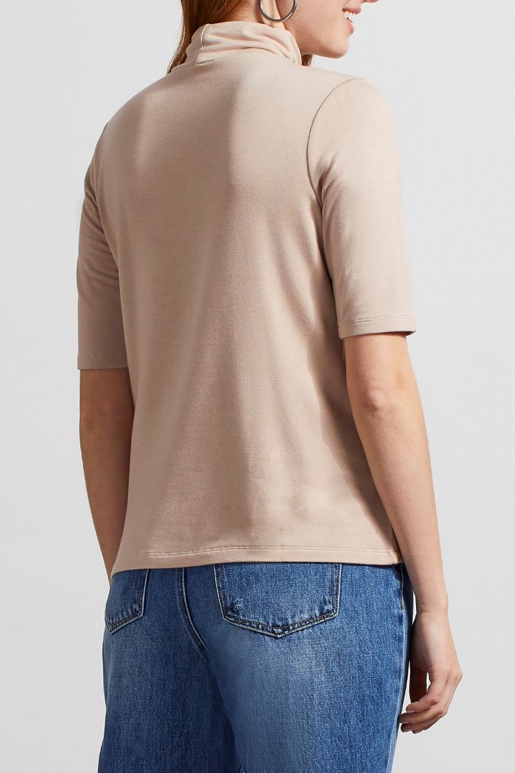 The Tribal Mock Neck Elbow Sleeve Top gives you versatile style mixed with comfortable all day wear. It is an excellent option for when you need something casual but still want to make an impression!