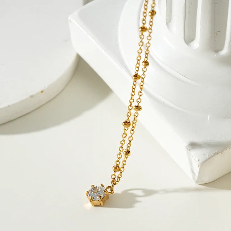 KADIRI: Solitaire Zirconia Charm Pendant on a Beaded Chain Necklace