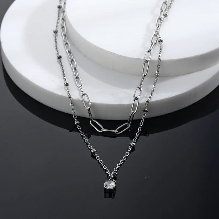 KATERI Silver: Pre-Layered Chains Necklace with a Solitaire Zirconia Charm Pendant