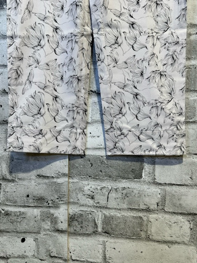 Pantalon de costume capri blanc à revers roulés