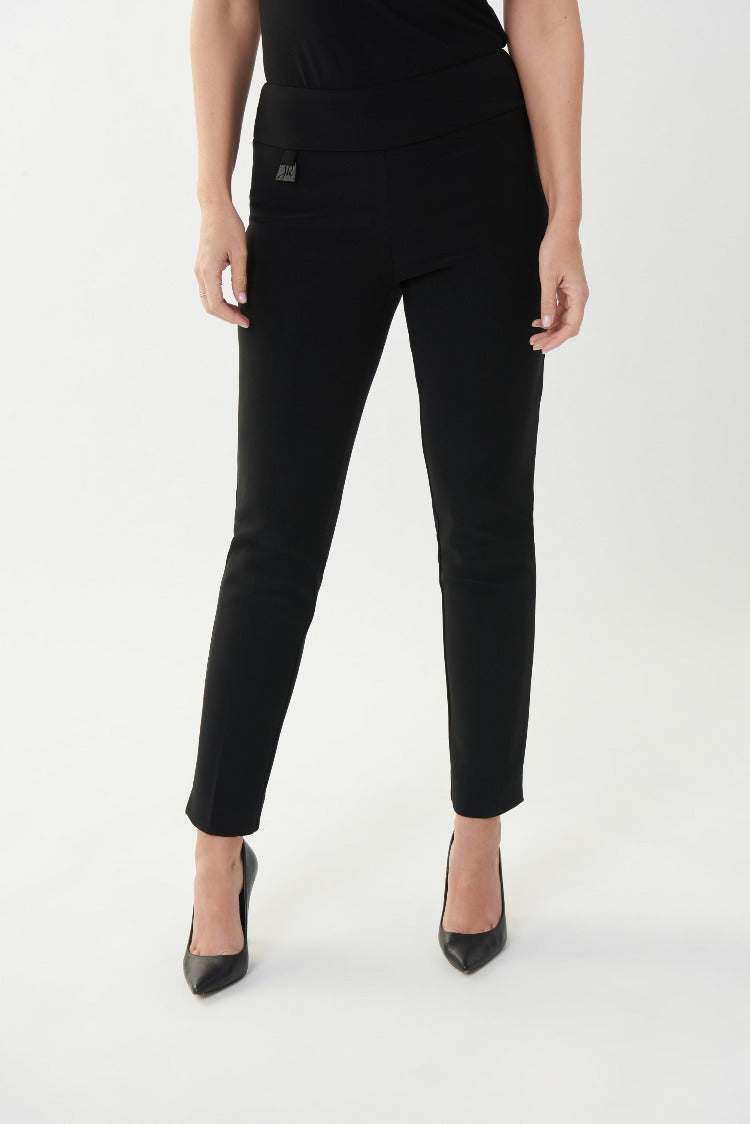 These classic pull on  Joseph Ribkoff Dress Pants are a staple for any professional woman. These pants come in a slim fit with stylish notches at the ankle to showcase your shoes and a signature Joseph Ribkoff metal hip tag. 