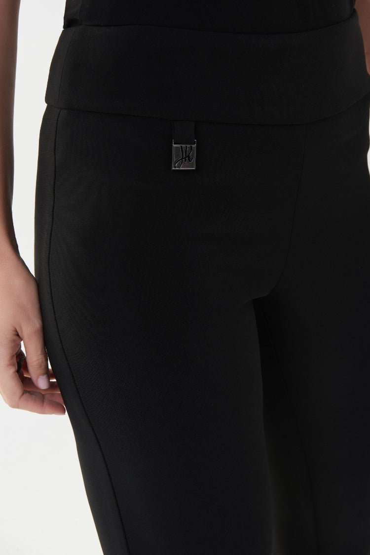 These classic pull on  Joseph Ribkoff Dress Pants are a staple for any professional woman. These pants come in a slim fit with stylish notches at the ankle to showcase your shoes and a signature Joseph Ribkoff metal hip tag. 