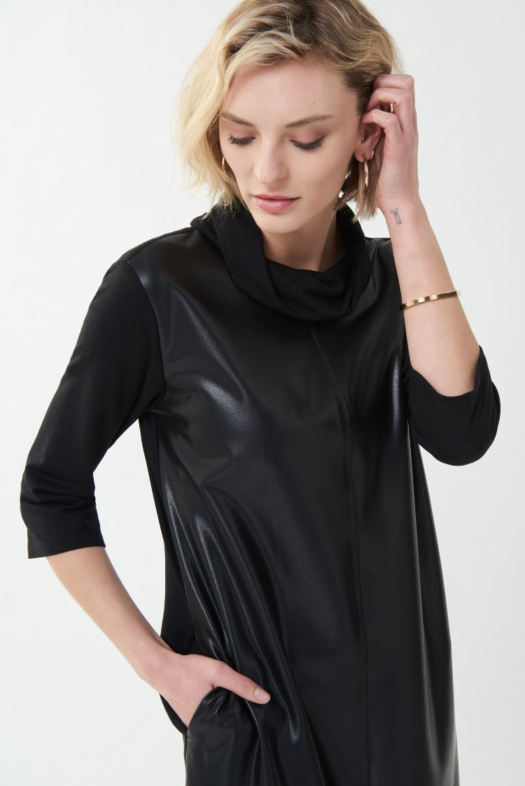 Show an edgy side in this Cowl Neck Pleather Dress from Joseph Ribkoff. This is a new LBD that features a classic cowl neck, 3/4 length sleeves and a pleather front. It gives you a great look that can be worn from day to night with fabulous heels or boots.  Proudly made in Canada.