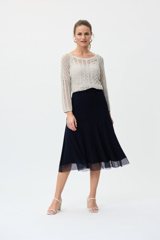 Let your inner child out to play with this Joseph Ribkoff Chiffon Skirt. Its chiffon overlay gives a beautiful flowy movement that you will not want to stop. Perfect to go dancing in, even if it's just down the hall.