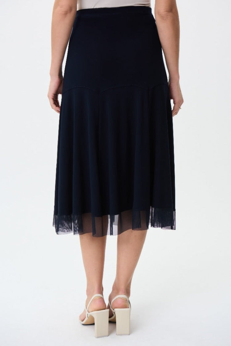 Let your inner child out to play with this Joseph Ribkoff Chiffon Skirt. Its chiffon overlay gives a beautiful flowy movement that you will not want to stop. Perfect to go dancing in, even if it's just down the hall.