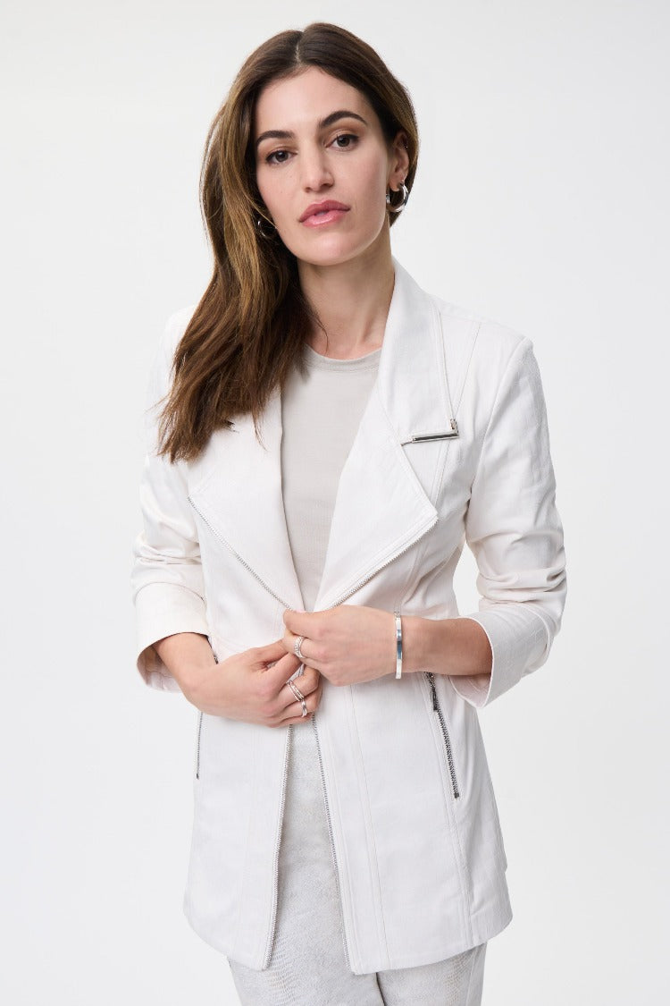 When you step out in this Joesph Ribkoff Suede Fabric Blazer you bring a fabulous fresh style. The longer cut with the silver zipper details and subtle snakeskin pattern are a perfect wat to finish any outfit. Pair it up with some dress pants for a cute office style or with a favourite pair of jeans for a contemporary casual look.