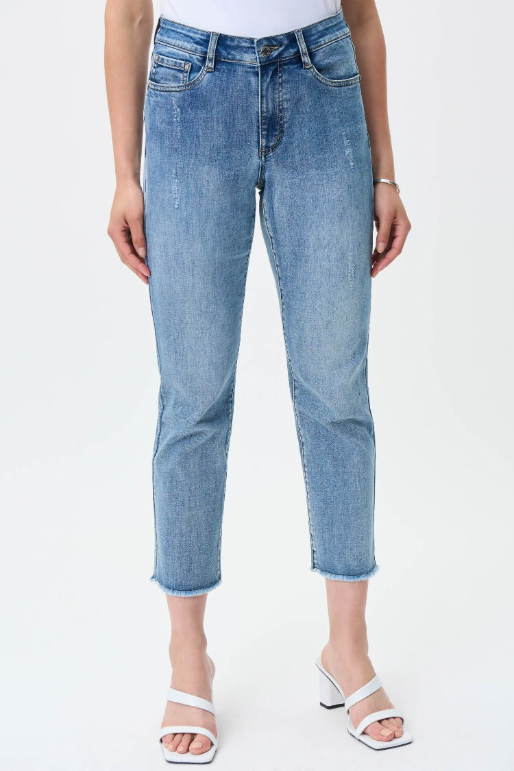 The fabulous mid-rise fit of the Joseph Ribkoff Frayed Jeans will give you a new favourite to wear. Featuring a straight crop, flattering frayed hem and classic five-pocket style makes them a timeless piece that you will wear time and again.