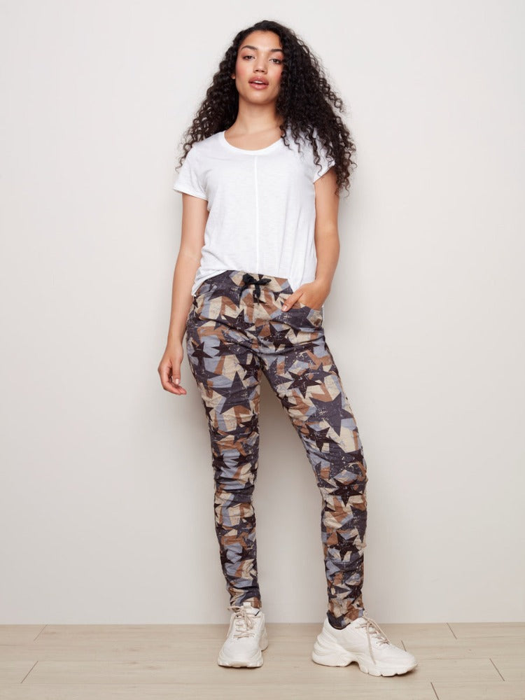 These Crinkle Joggers from Charlie B are a fun way to add colour and texture to your closet. These feature an elastic waistband with drawstring, front and back pockets, an eye-catching pattern and faux-suede feel.