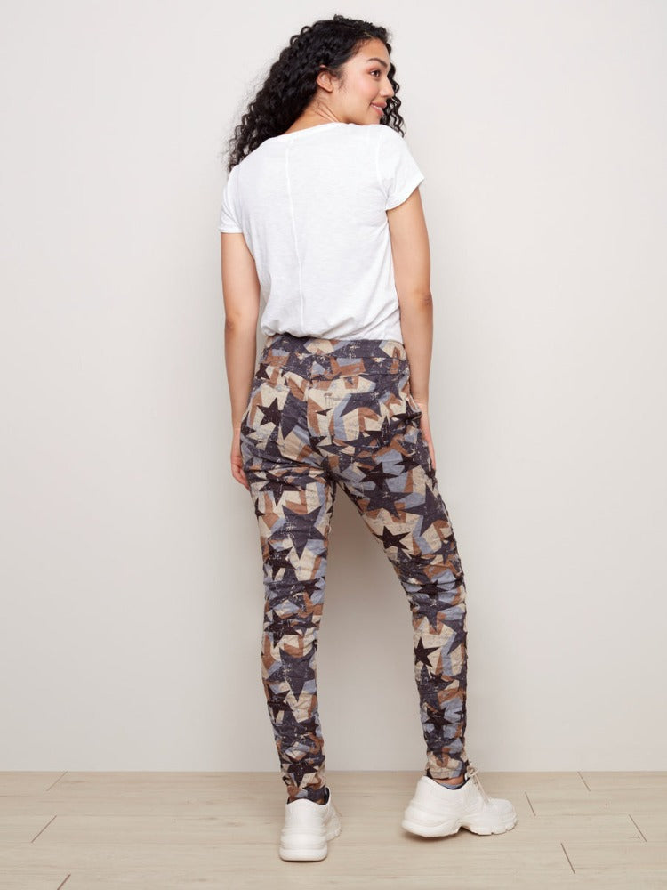 These Crinkle Joggers from Charlie B are a fun way to add colour and texture to your closet. These feature an elastic waistband with drawstring, front and back pockets, an eye-catching pattern and faux-suede feel.